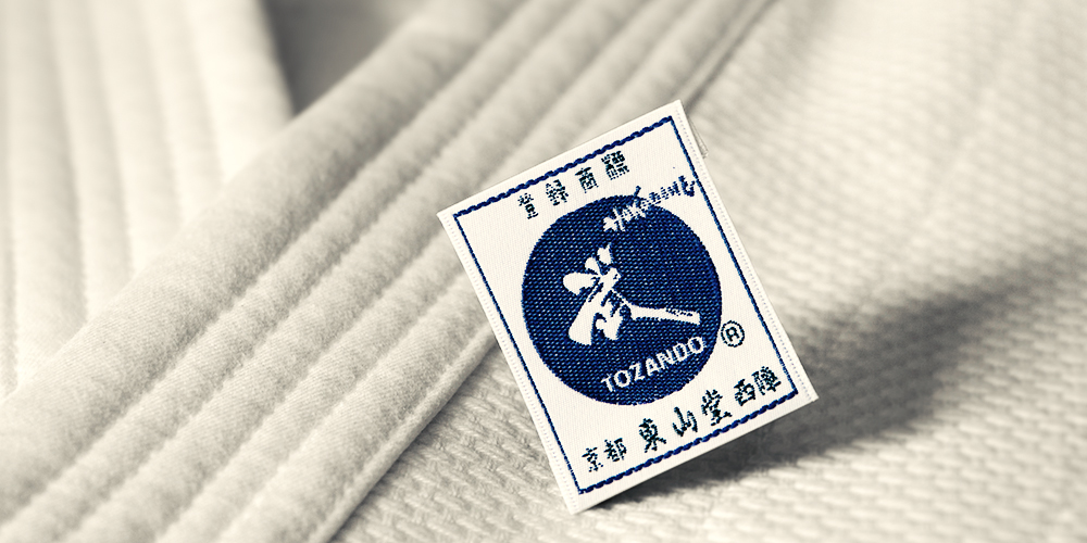 Tozando Aikido uniform and Tozando World-famous logo image